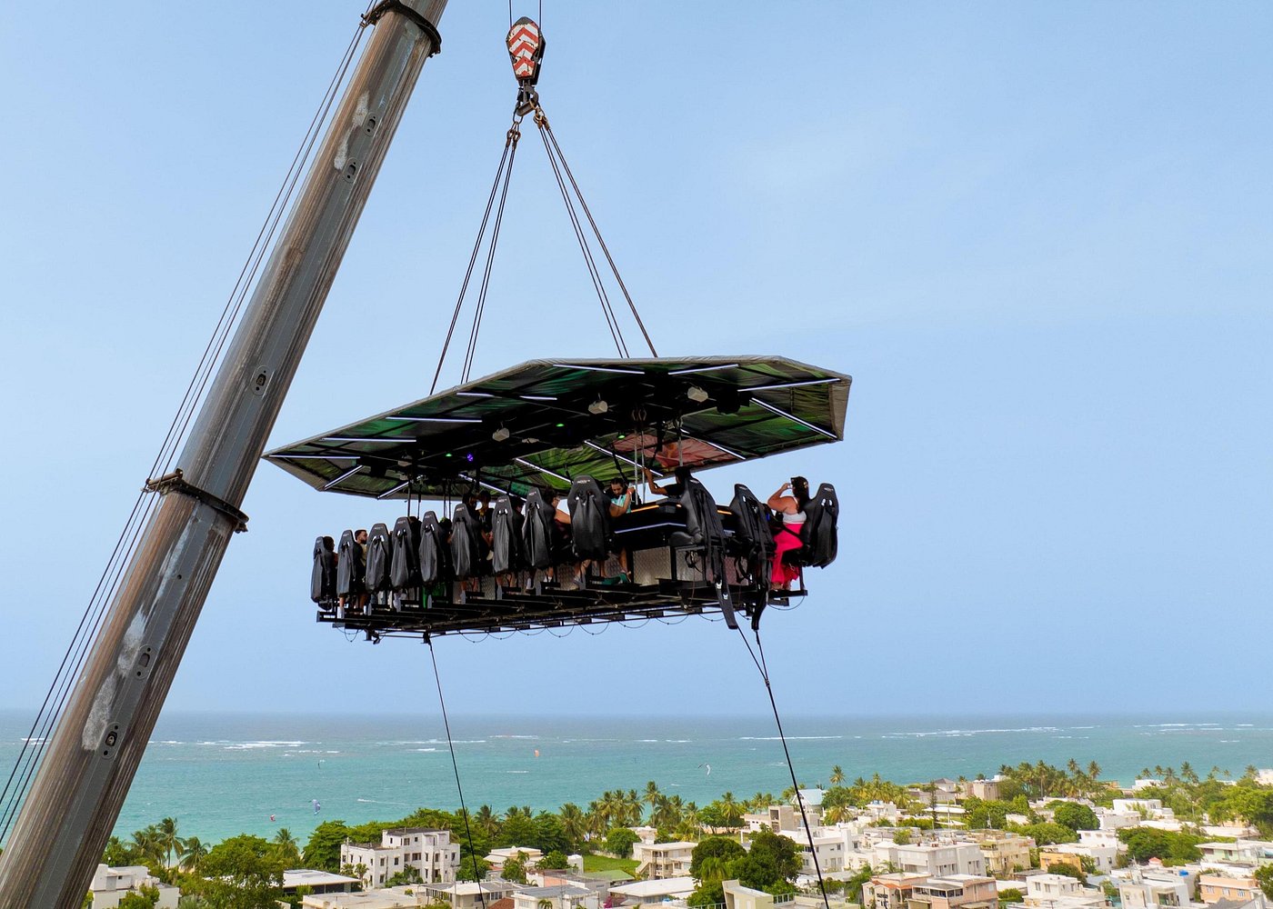 FlyDining table suspended above the San Juan coast